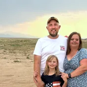 David Hayes with his wife and daughter